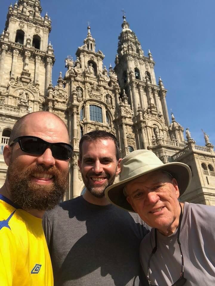 David King, Ph.D. (center), and friends at Santiago de Compostela Cathedral