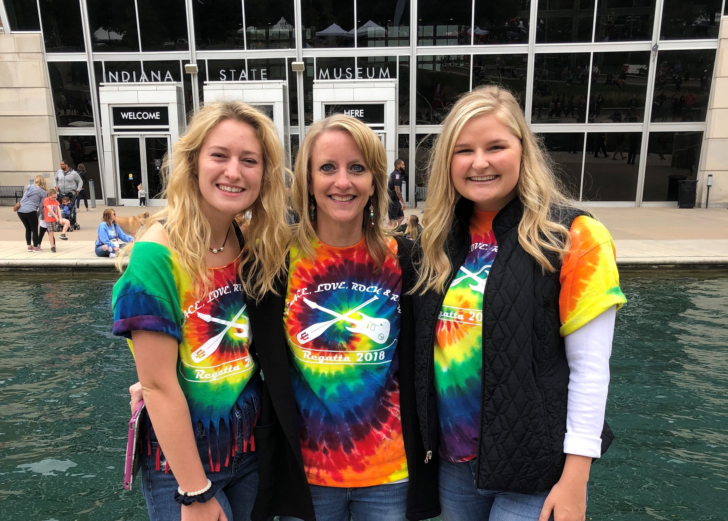 From l-r: Kellie Waring, Pamela Clark, and Justine Oppelt cheer on the Water Lillies team at the 10th Annual IUPUI Regatta