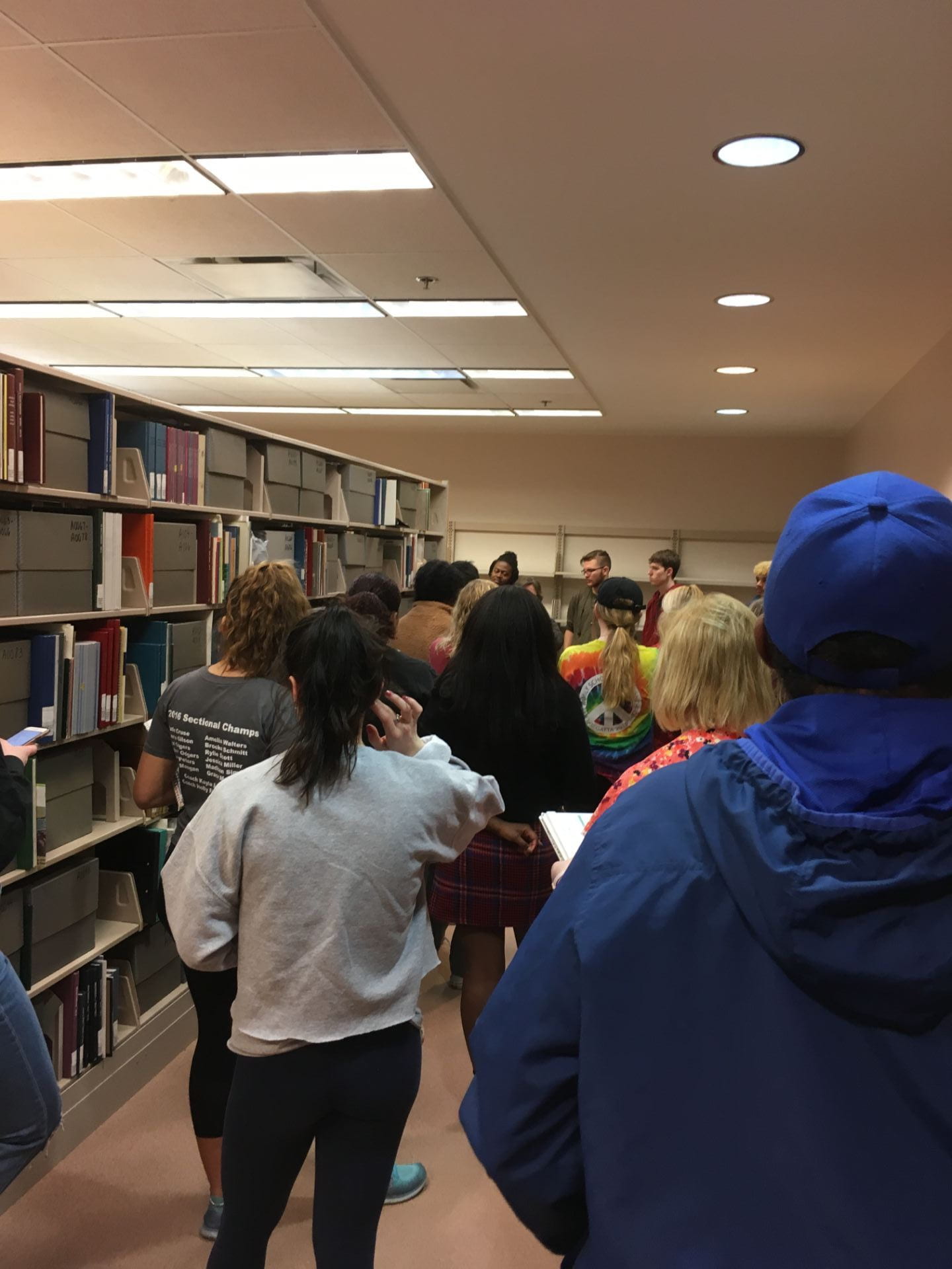 Students walk through the university's archives.