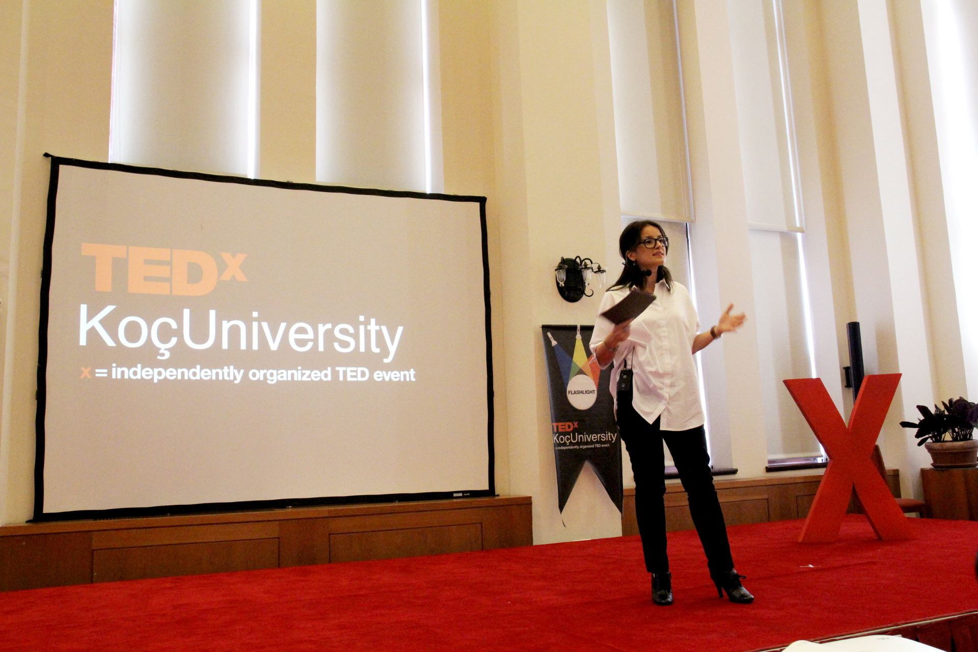 Sevda Kilicalp speaking at a TEDx event. 