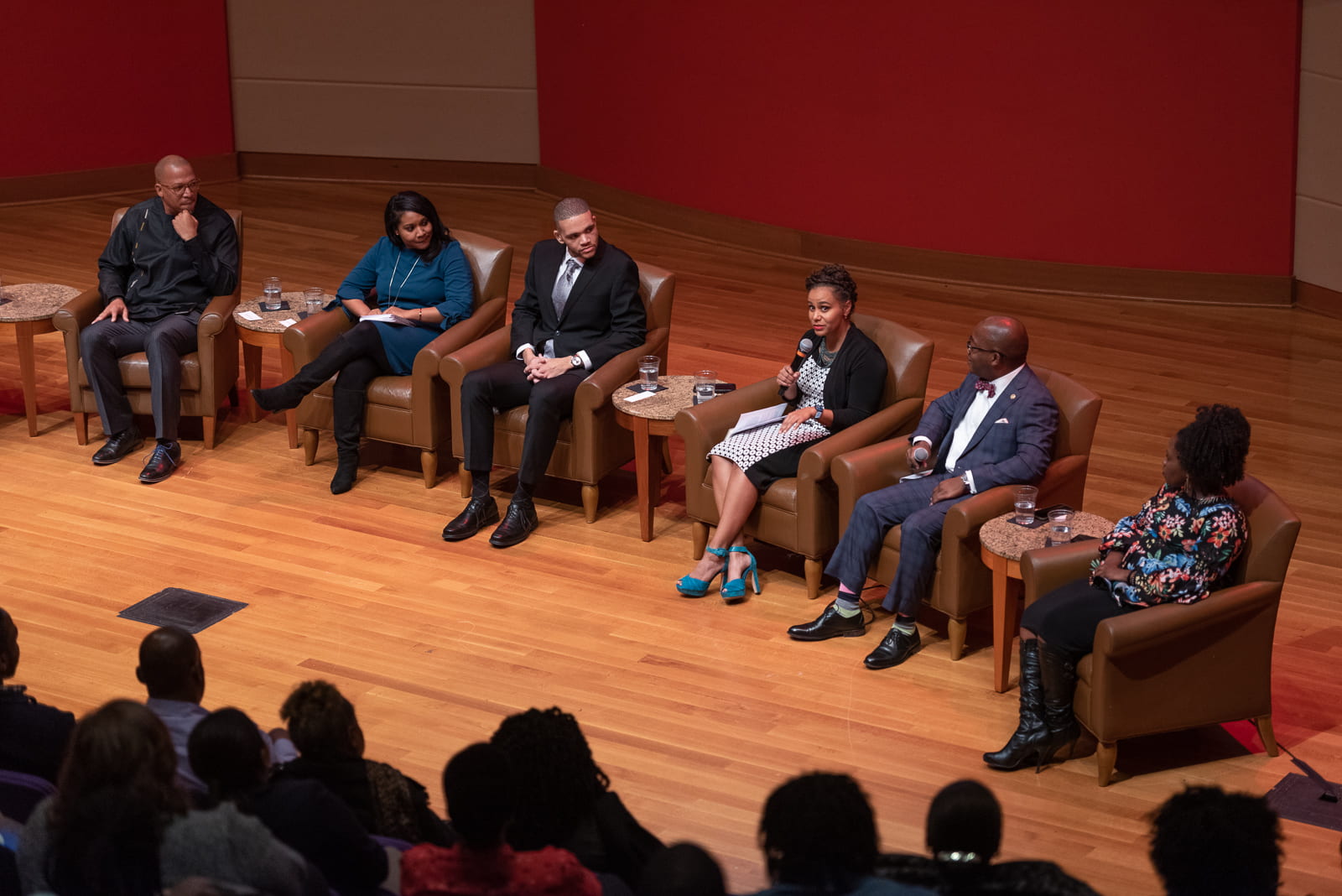 The featured panel members speak about their experiences. From left to right: Edward Jones, Charmaine Brown, Collin Mays, Tiara Dungy, Kim Nyoni, Akilah Wallace.